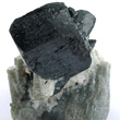 Manganocolumbite on Matrix