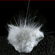 Mesolite Hairs on Thomsonite