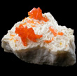 Bright Orange Orpiment on Barite