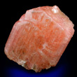 Salmon-colored Serandite