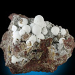 White Thomsonite on Dark Matrix